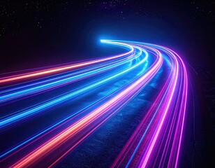 Illuminated path of colored light streaks curving through a dark space with a starry backdrop