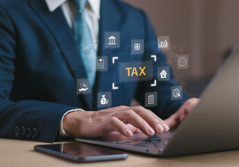 concept of finance or income in online tax calculations ,Man is tapping a virtual computer screen to manage income or expenses or to fill out personal or corporate income tax form