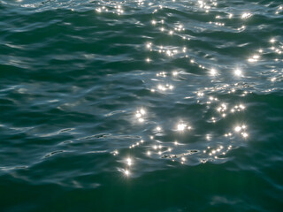 Beautiful light effects on the surface of the lagoon in Venice. Venice, the city of water in Italy.