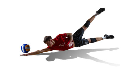 Volleyball defender stretching sideways to save ball isolated with dark shadow. Concept of lateral movement, defensive skills, reaction timing, sports education, coaching materials.