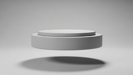 A gray podium with a shadow on a white background.