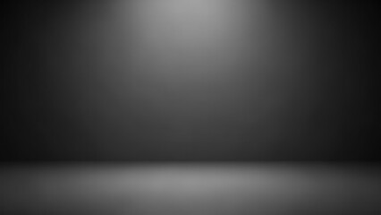 Empty black studio room with a spotlight on the wall.