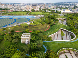 Aerial view of the vast green landscape of Taichung Central Park, a sustainable urban forest on a former airport. Taichung, Taiwan.
