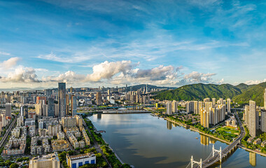 Aerial view of the modern city skyline and river scenery in Zhuhai, China.