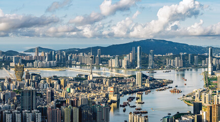 Aerial view of the modern city skyline and sea scenery in Macau.