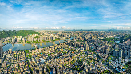 Aerial view of the dense residential buildings and river scenery in Zhuhai, China.