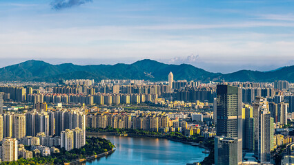 Aerial view of the dense residential buildings and river landscape in Zhuhai.