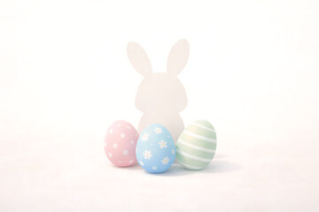 Fototapeta premium Minimal bunny silhouette with Easter eggs, soft shadows, clean modern poster
