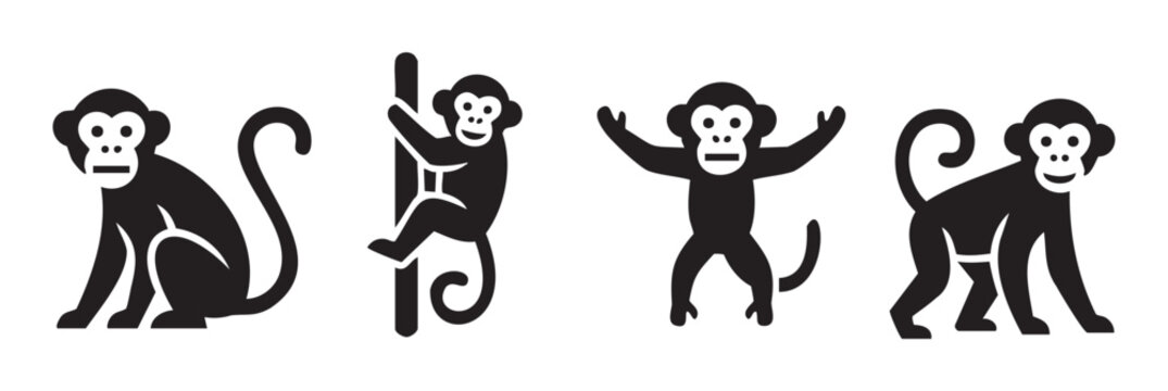 Four black monkey icons in various poses, including sitting, climbing, and standing, showcasing playful and expressive animal characters for design projects.