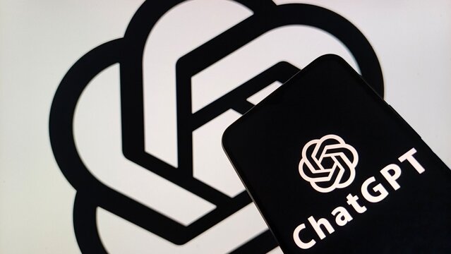 Close-up of ChatGPT logo on black card with white background