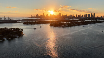 Fototapeta premium Sunset City At Miami Beach In Florida United States. Sunset Beach. Illuminated Cityscape. Downtown City. Sunset City At Miami Beach In Florida United States. Amazing Sunset Skyline.