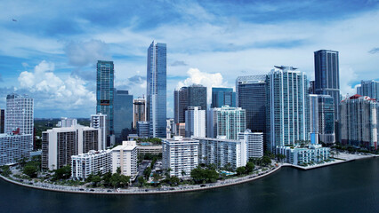 Fototapeta premium Miami Skyline In Miami Florida United States. Modern Glass Skyscraper Soars Above A Bustling City. Industry Skyline Commercial Building Awesome. Commercial Building Architecture Business.