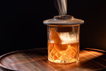 Aromatic smoke added to the top of an Old Fashioned Cocktail