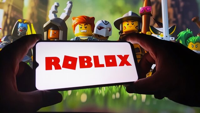Roblox game on smartphone with Lego characters in background