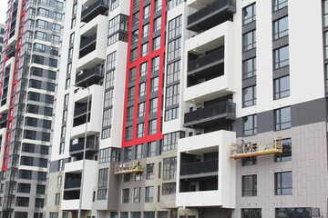 high rise apartment building, the facade of the new building