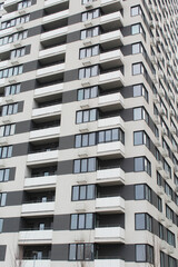 high rise apartment building, the facade of the new building