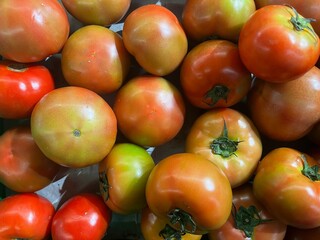 View from above of fresh tomatoes in the market