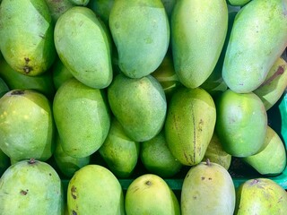 View from above of fresh mangoes in the market