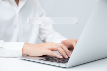 Businessman typing on a laptop, analyzing data for SEO strategy, keyword research, and digital marketing growth.