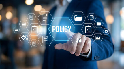 Fototapeta premium Professional,businessman,pointing,at,policy,hexagon,icon,managing,corporate,compliance,legal,regulations,and,governance,standards,with,document,folder,and,checklist,symbols,interface.