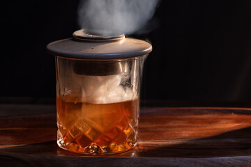 Aromatic smoke added to the top of an Old Fashioned Cocktail
