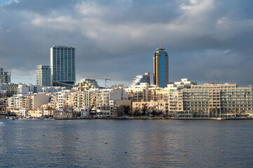 Modern apartment buildings along the coastal area of Sliema, Malta, highlighting contemporary Mediterranean urban living and waterfront architecture Sliema, Malta, 9 DEC 2025.