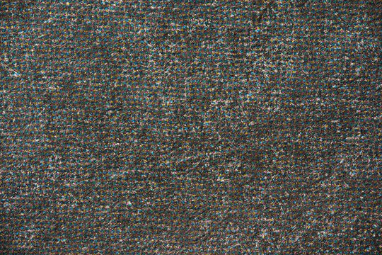 Macro of Overprinted CMYK Dots Creating Dark Halftone Texture