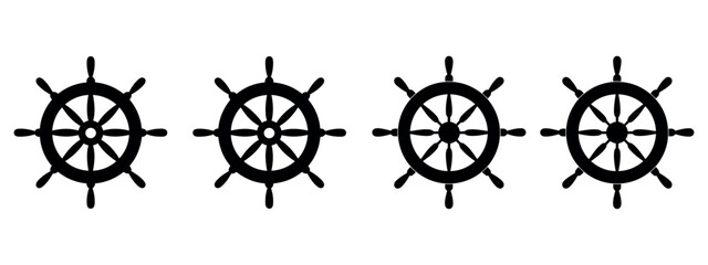 Four ship helm steering wheels in a row vector. © akram
