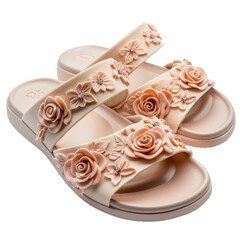 A pair of stylish pink sandals with floral decorations on a black background