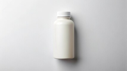 White mockup medical bottle flat lay, blank label area, neat composition.