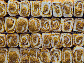 Sweet street food rolls displaying intricate pastry texture