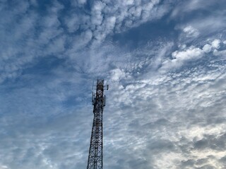 Obraz premium Telecommunication Tower Under Cloudy Sky