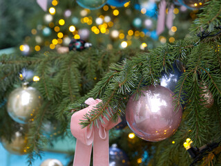 Spruce tree with christmas balls on branches.