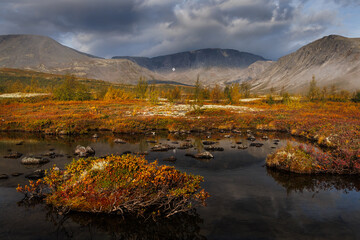 Autumn Mountain Landscape With Lake, Colorful Foliage, Rocks, and Misty Sky Above