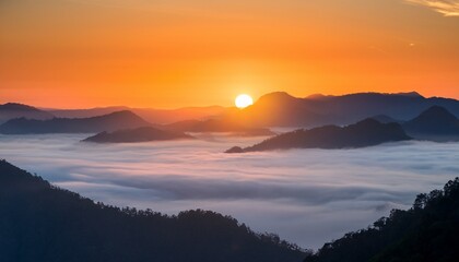 Obraz premium Beautiful Sunrise Above Soft Mist And Mountain Layers