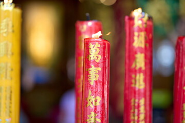 Bangkok, Thailand - 24th December 2025: Candles at San Chao Mae Guan Yin (Mulanithi Thian Fah)