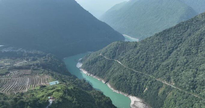 Aerial footage of beautiful tropical forest mountain landscape in the Yalu Zangbu River valley area, Tibet,China