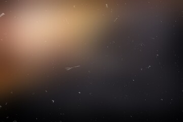 Fototapeta premium Golden cream light drifting into deep charcoal shadows with fine dust specks, vintage photo look overlay for Photoshop giving cinematic side-light warmth and classic film mood to portraits and edits