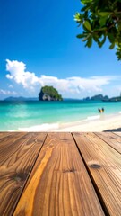 Fototapeta premium Wooden table foregrounds a tropical beach with clear blue water and sky