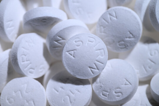 Macro Close up of White Aspirin Tablets 