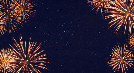 Golden fireworks explode against a starry night sky