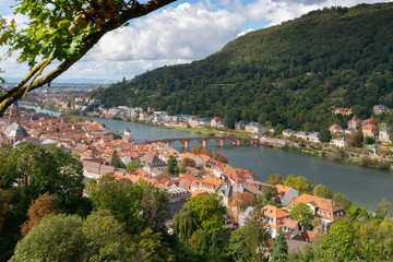 Old Bridge over Neckar River Through Trees.A high angle, view of Heidelberg&rsquo;s old town and the old bridge over the Neckar River. Heidelberg, Germany.
