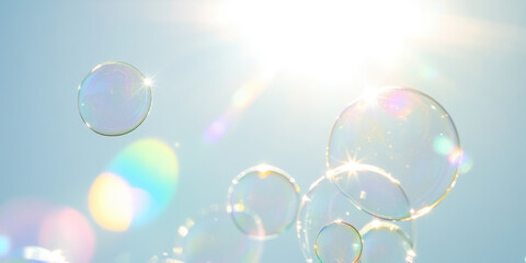 iridescent soap bubbles drifting upward in vibrant sunny blue sky ethereal dreamy wallpaper with ample copy space