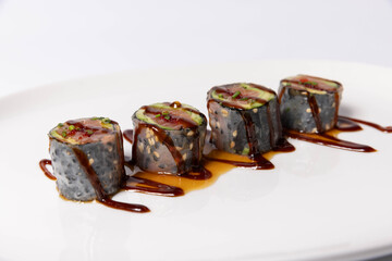 Sushi serving on white plate