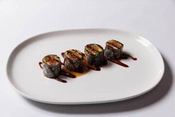 Sushi serving on white plate