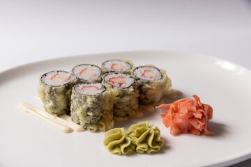 Sushi serving on white plate