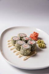 Sushi serving on white plate