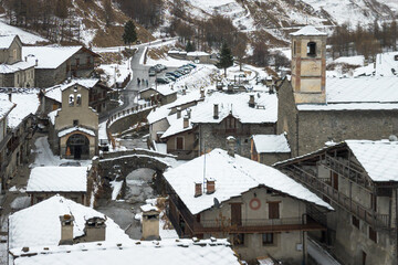 Aerial view of Chianale during winter season, a typical alpine village in Piedmont region, Italy