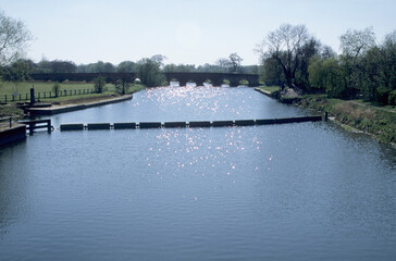 Landscape view of River Great Ouse Roxton Weir Great Barford Bedfordshire UK Europe. 