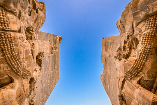 Carved sculptures of Gate of All Nations in ruins of Persepolis ancient city in Fars Province, Iran